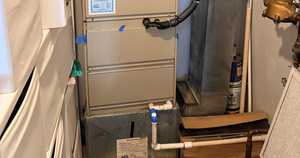 Old Aging Furnace And Bulky Ductwork.jpg