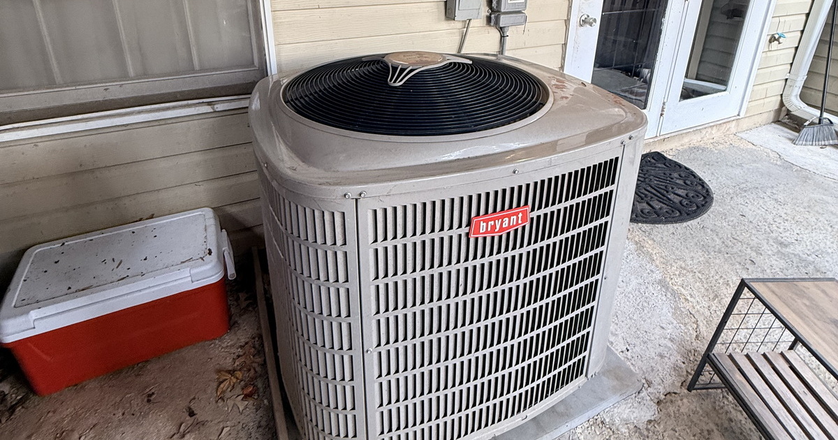 Inefficient HVAC Unit Placement Under Deck.jpeg