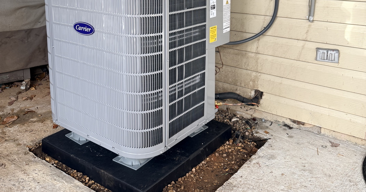 Carrier R454B Outdoor Unit On Leveled Base.jpeg