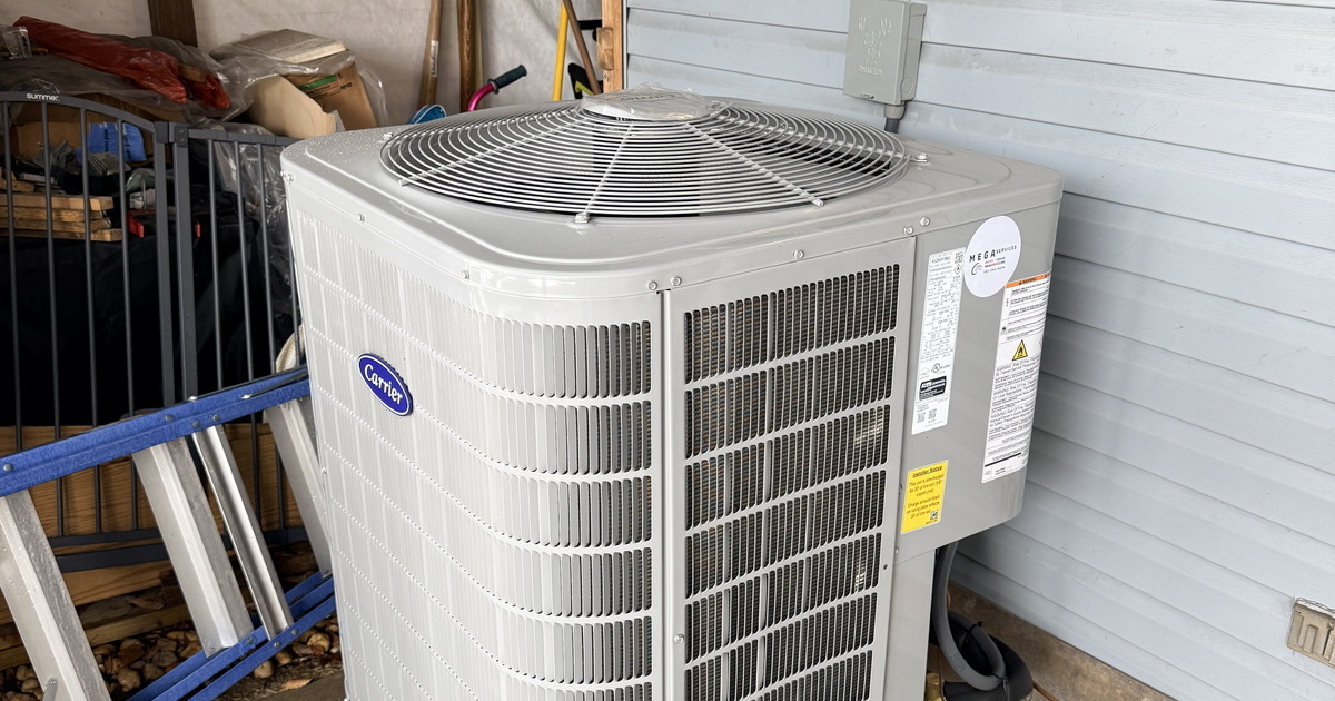 New High Efficiency Carrier Outdoor AC Condenser Installation.jpg